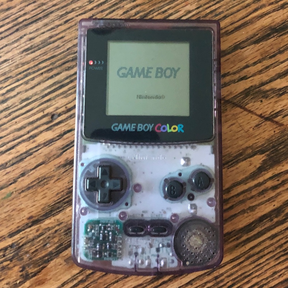 Gameboy color w/games and travel case.